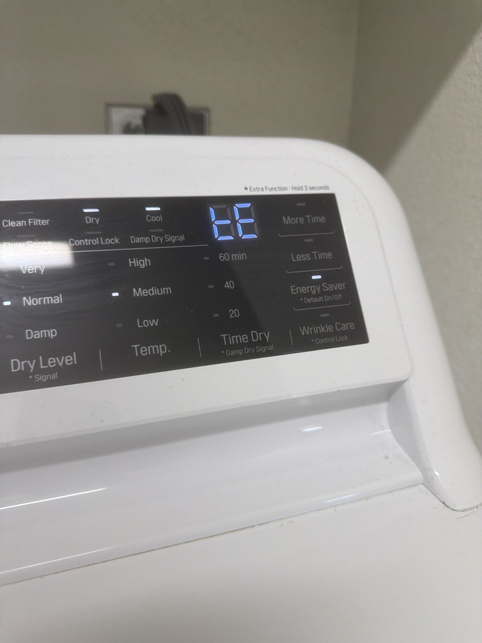 Washer repair in progress in a Naples home