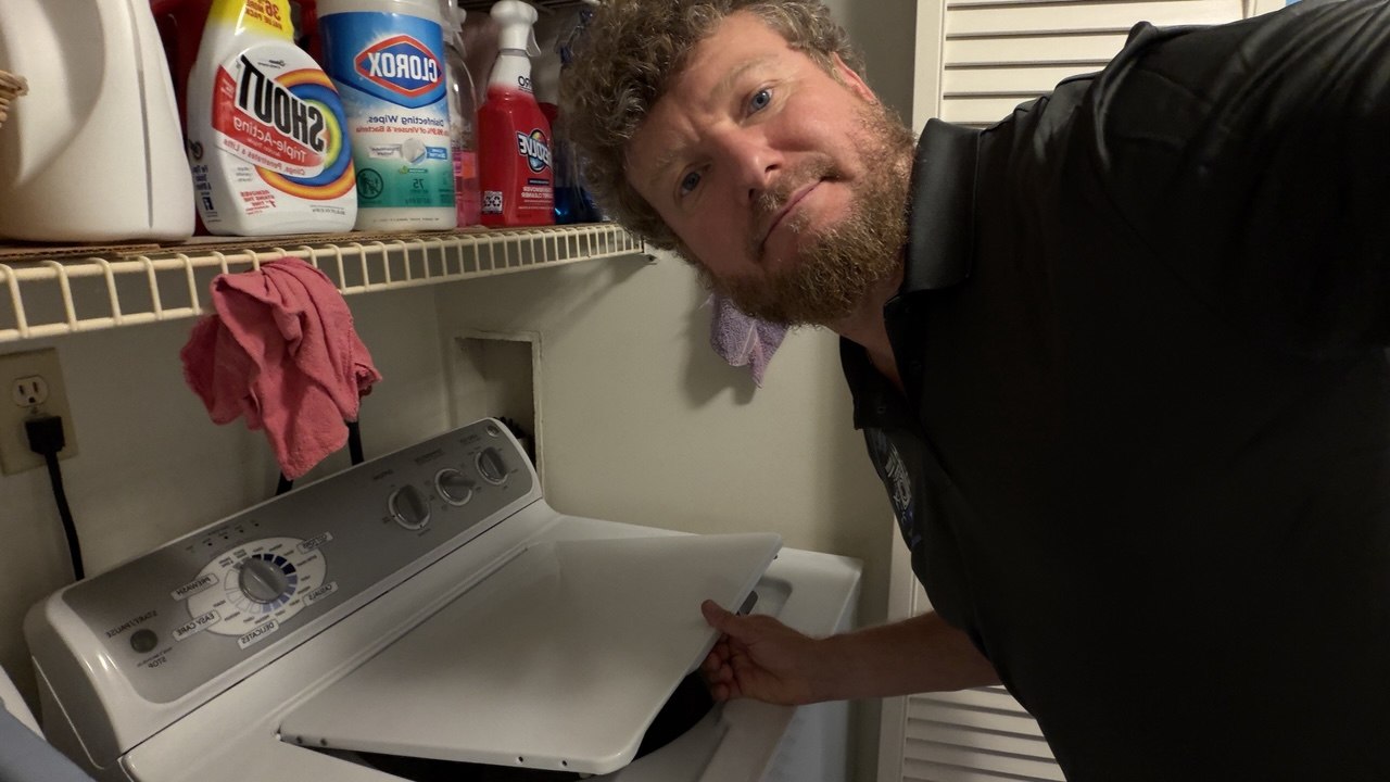 Washer repair in progress in a Naples home