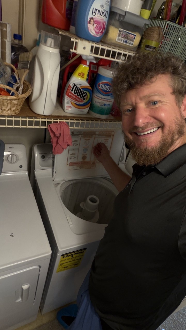 Washer repair in progress in a Naples home