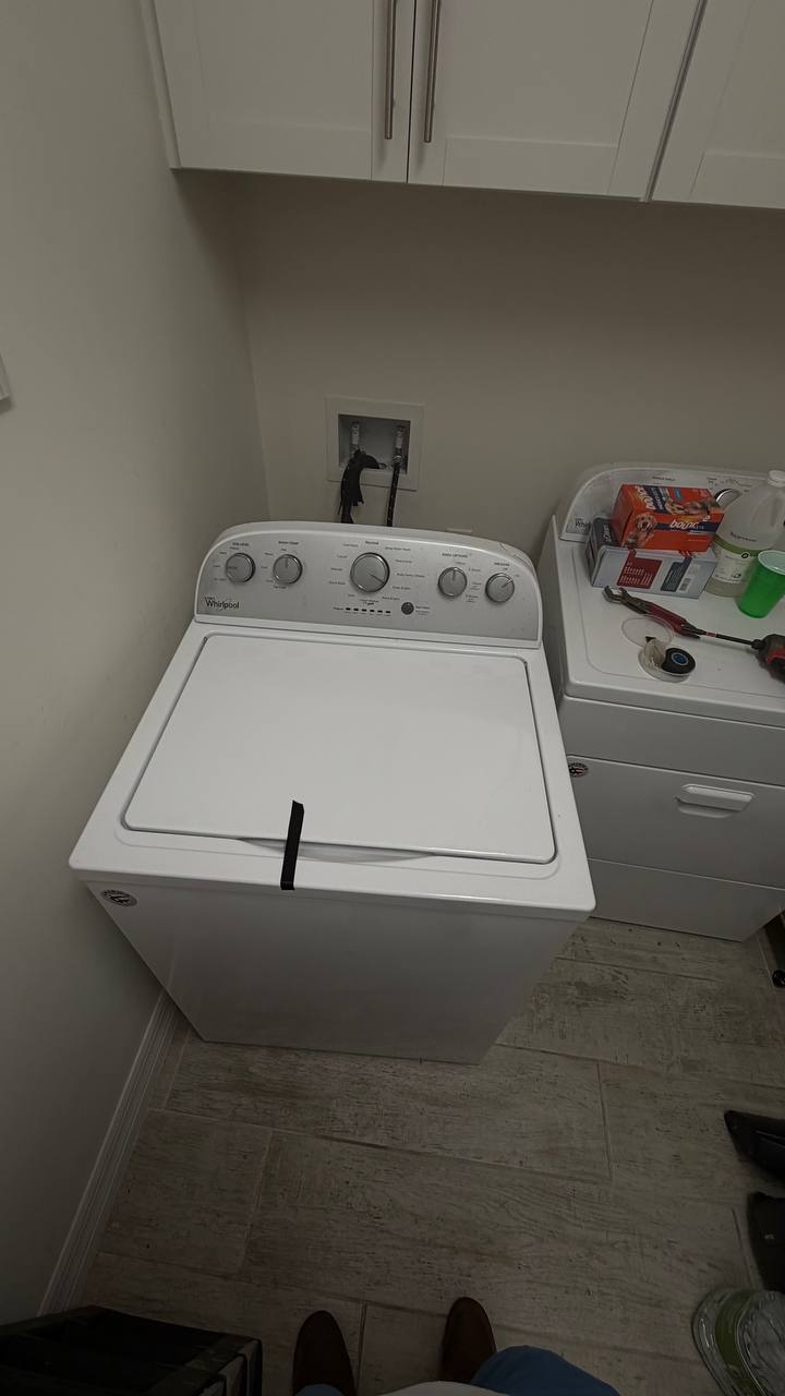 Whirlpool top-load washer diagnosis in a Naples laundry room
